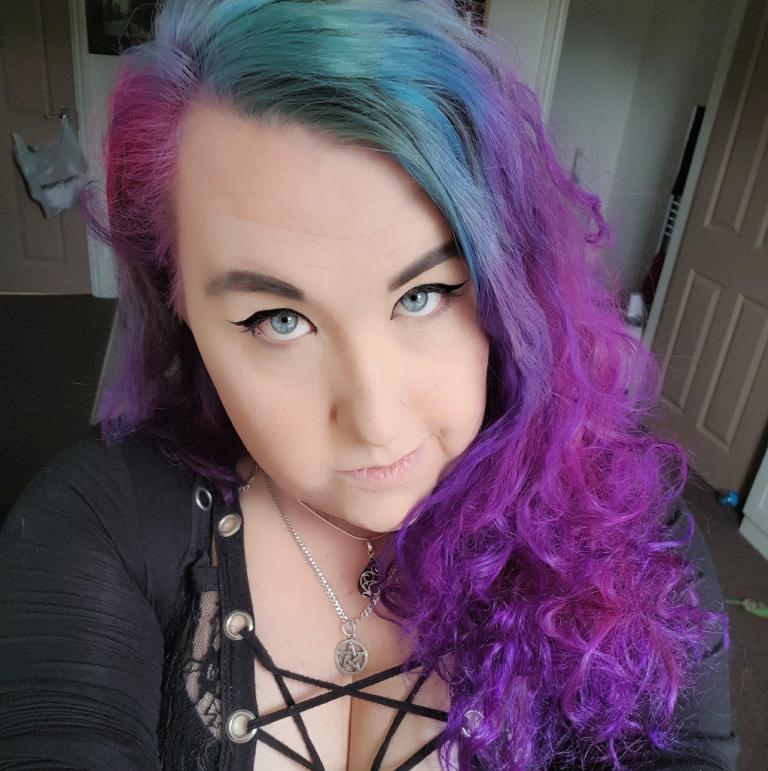 photo of website owner with colorful hair